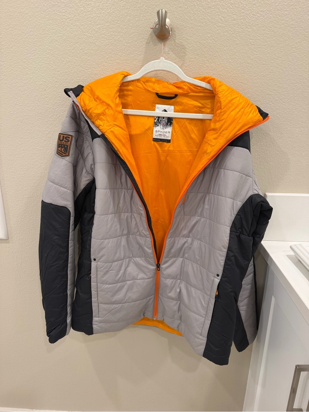 Spyder Men’s Hooded Puffer Jacket in Gray, Black & Orange